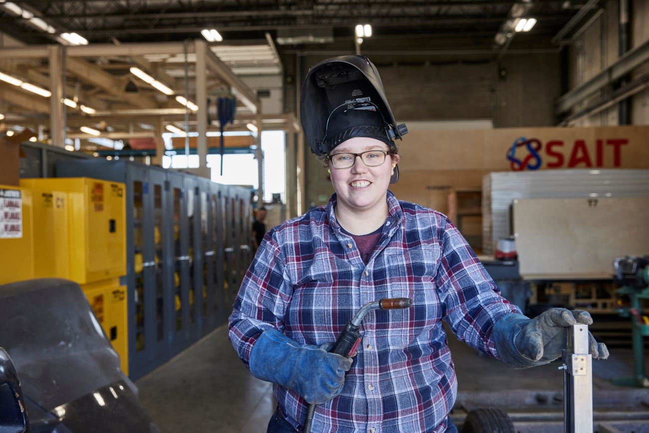 RV technician smiling at the camera