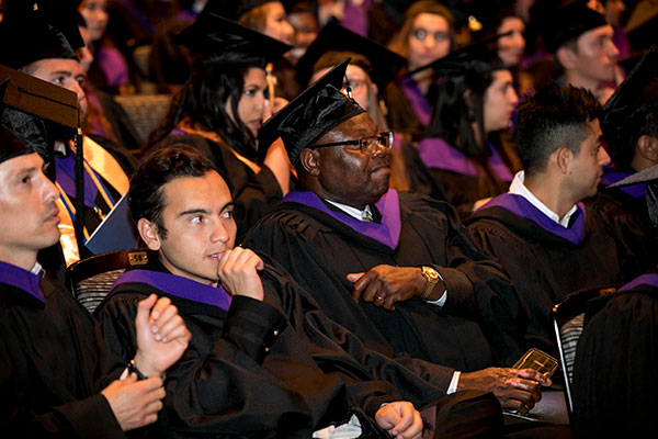 A group of MacPhail School of Energy graduates listen during their convocation ceremony.