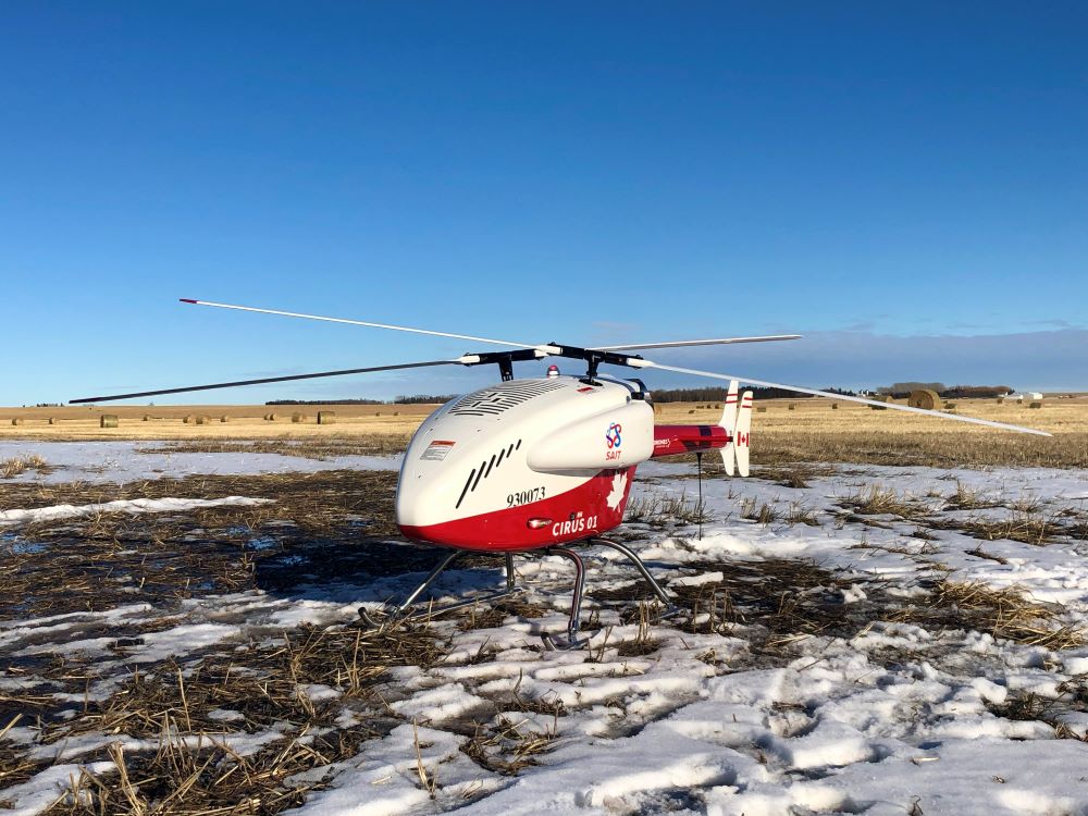 red and white drone with the sait logo