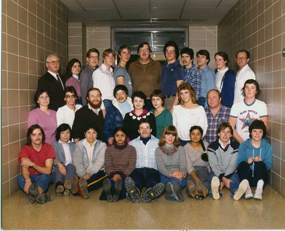 A group of SAIT Hospitality and Tourism students from 1983 pose for a group photo