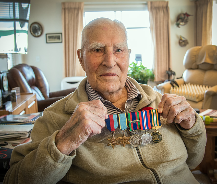 Second World War veteran showing medals