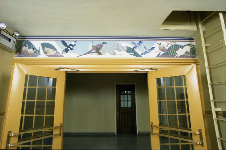 Mural titled Wildlife of Southern Alberta after being restored by Gertrude Hudson.