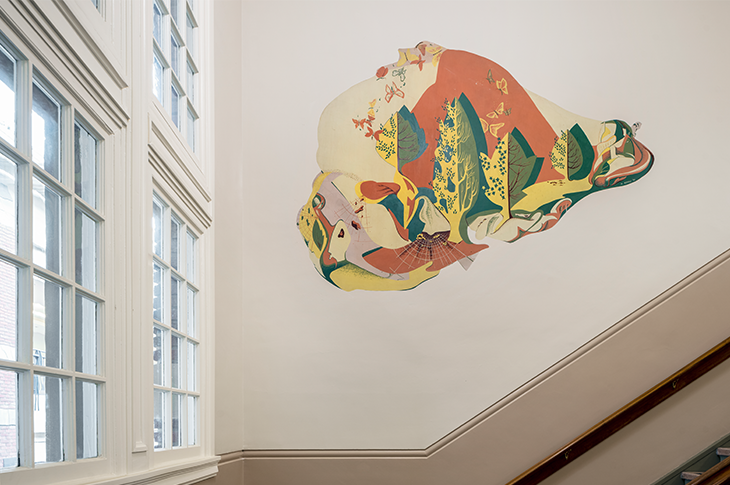 Full view of Henry Bonli mural in Heritage Hall stairwell Close up of orange and yellow butterflies on a leaf.
