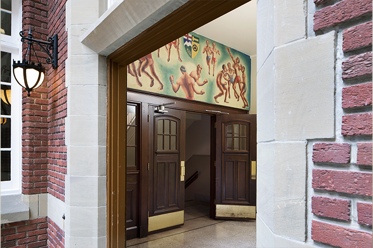 Sports at Tech, 1949 by Roy Kiyooka. View of the mural from outside the east doors from Heritage Hall to Stan Grad Centre, main floor. 