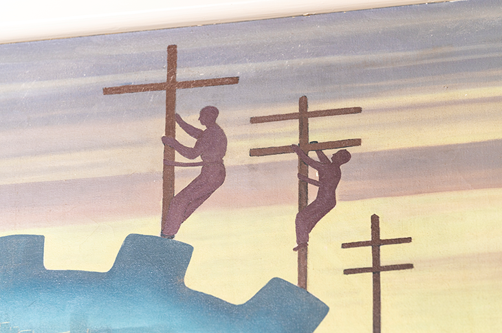 Close up of silhouettes climbing power poles.