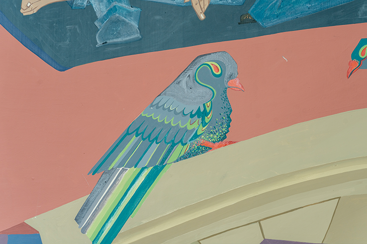 Blue bird on a mural.