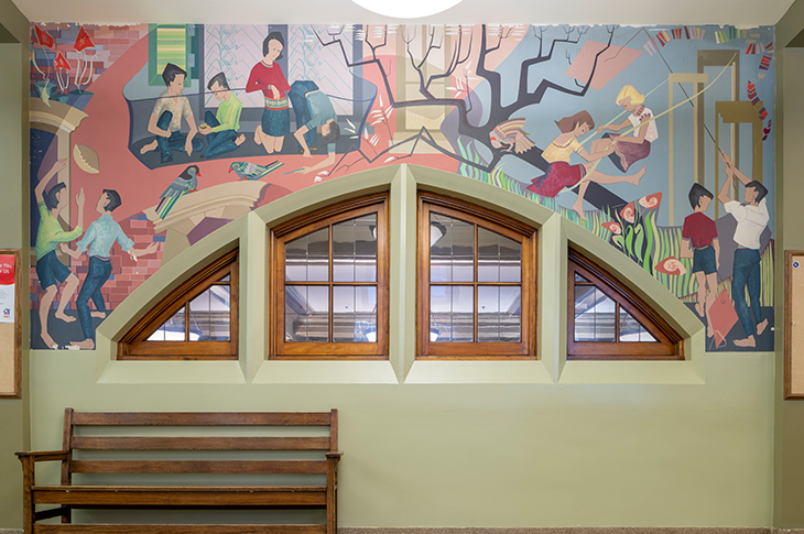 Full view of mural with children on it.