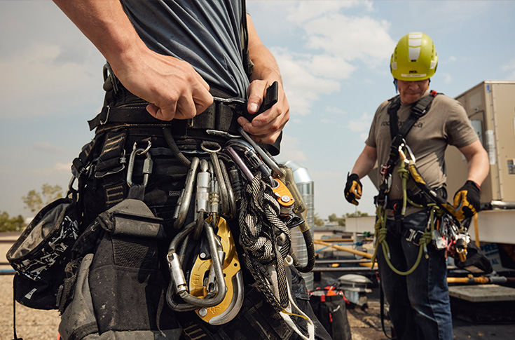 Close up of utility belt and safety gear