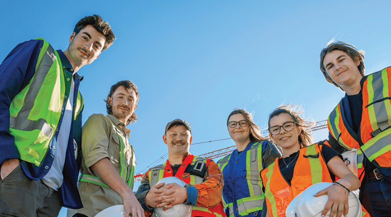 Group of students wearing construction safety gear
