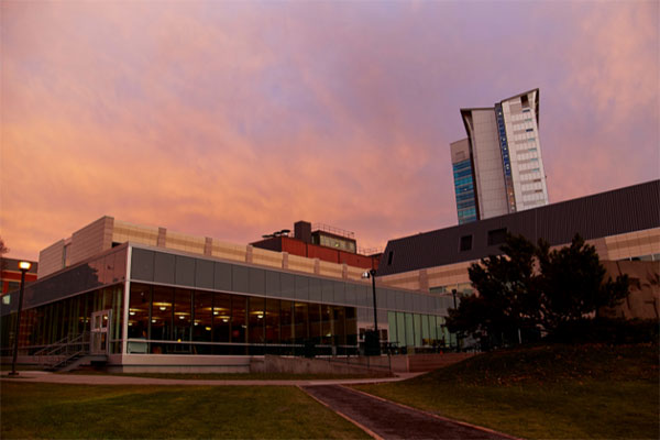 The John Ware Building on SAIT campus seen at sunset.