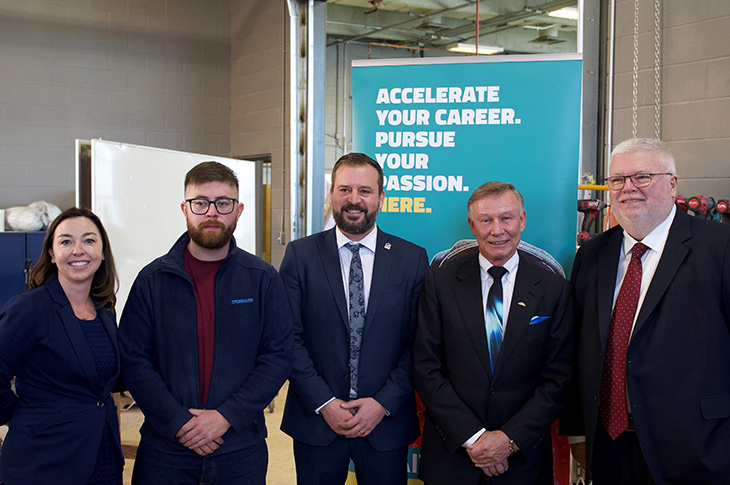 Left to right: Reva Bond, Dean of the School of Construction, Michael Orr, Carpentry student, Scott Fash, Executive Director of BILD Alberta, Jay Westman, Chairman and CEO of Jayman BUILT, and Dr. David Ross, SAIT President and CEO.