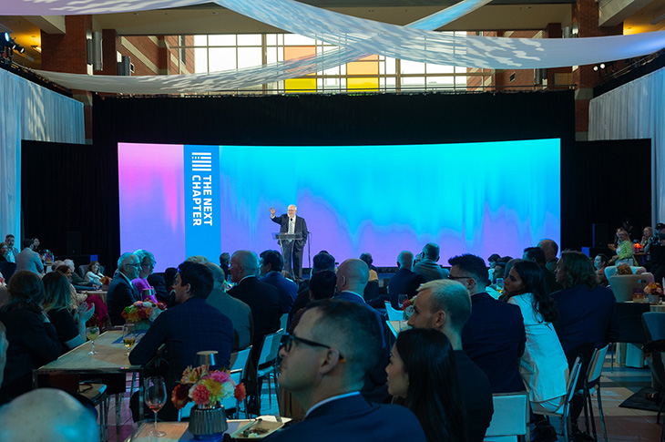 SAIT President and CEO, Dr. David Ross on stage at The Next Chapter event.