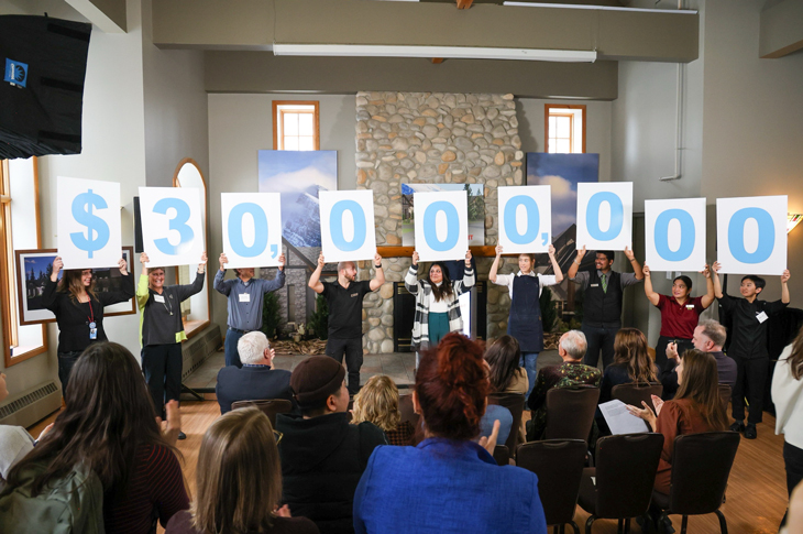 People celebrate the $30 million gift in Banff.