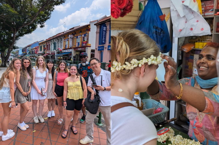 Students are shown standing in the streets of Little India. One student is shown having a flower crown placed on their head.