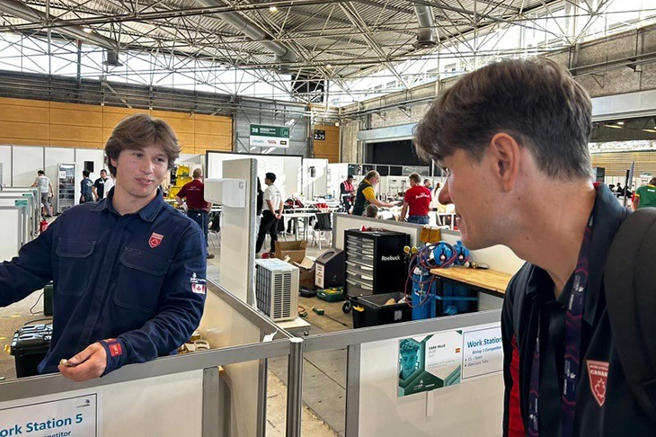 Tyler Cherkowski and Tyson Frank talking at WorldSkills