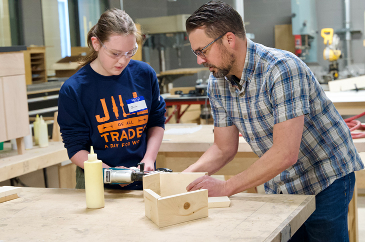 Getting tips on carpentry.